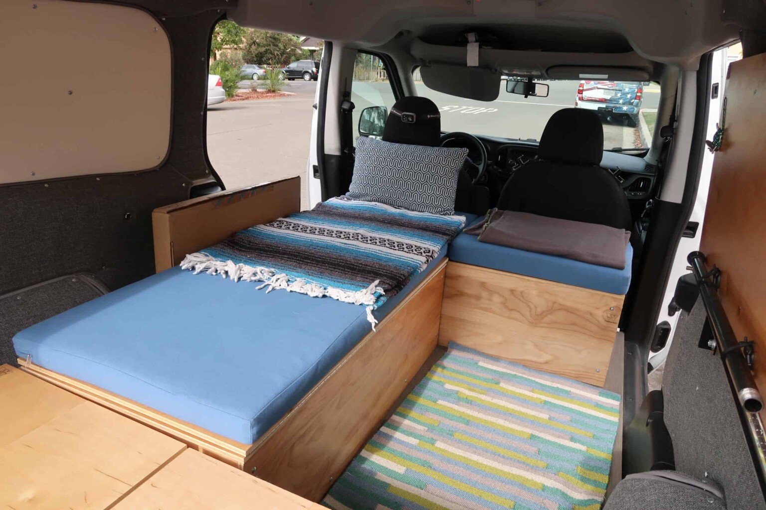 inside bed of camper van