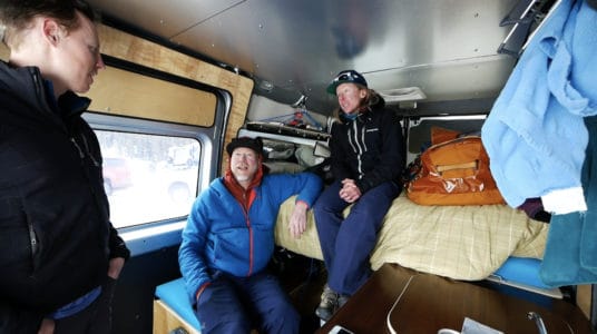 Interior view of couple's custom conversion camper van