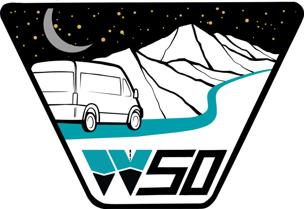 Wayfarer 50 Patch - graphic of van set against mountains with a night sky with a silver moon and stars