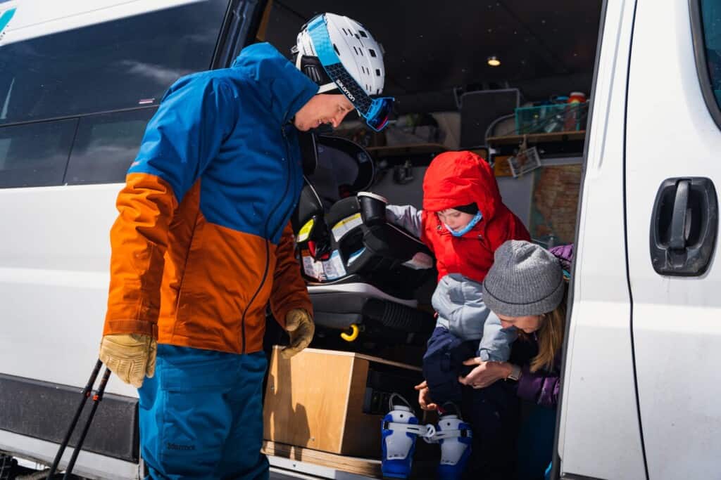 gearing up for the family ski trip in a camper van