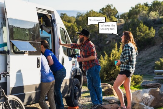 camper van with people standing by it