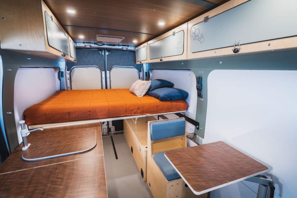 Wayfarer Vans interior bed table and kitchen galley